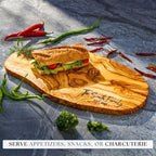 A unique gift for your boyfriend: a custom-engraved olive wood cutting board.