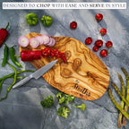 A unique gift for your boyfriend: a custom-engraved olive wood cutting board.