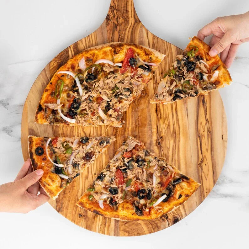 Custom engraved olive wood pizza board – a must-have for family gatherings