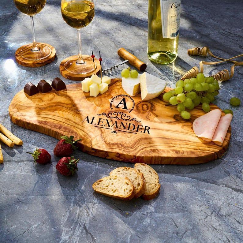 Personalized custom engraved olive wood cutting board as a gift for husband and wife