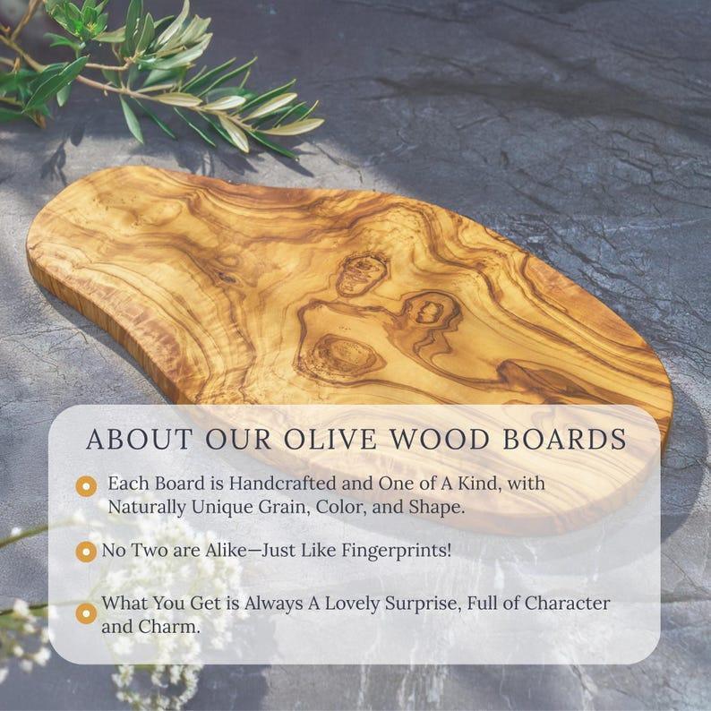 Personalized custom engraved olive wood cutting board as a gift for husband and wife