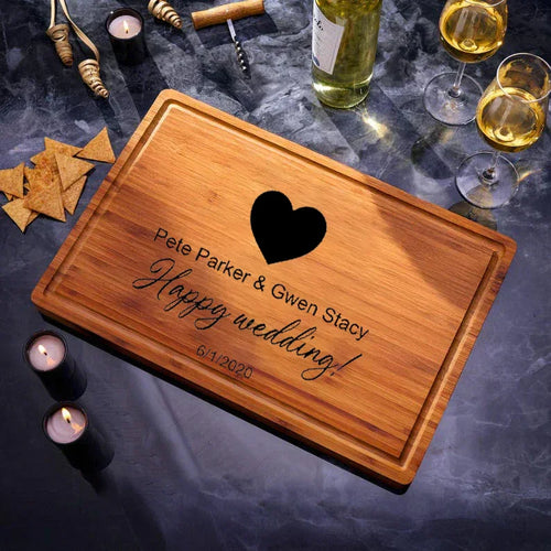 A perfect wedding and engagement gift, personalized carved cutting board