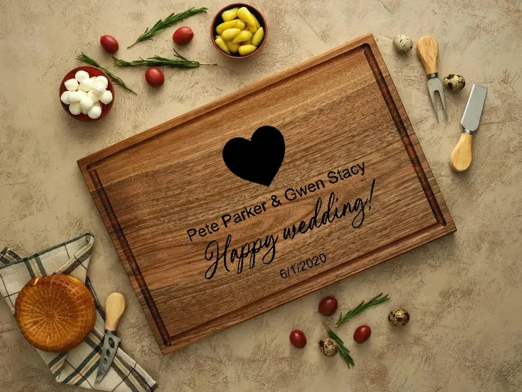 The walnut wood cutting board is the perfect wedding and engagement blessing gift